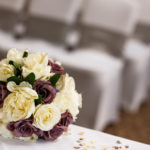 Bridal bouquet of flowers on table in wedding ceremony