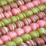 Tray of macarons being served at a wedding or event