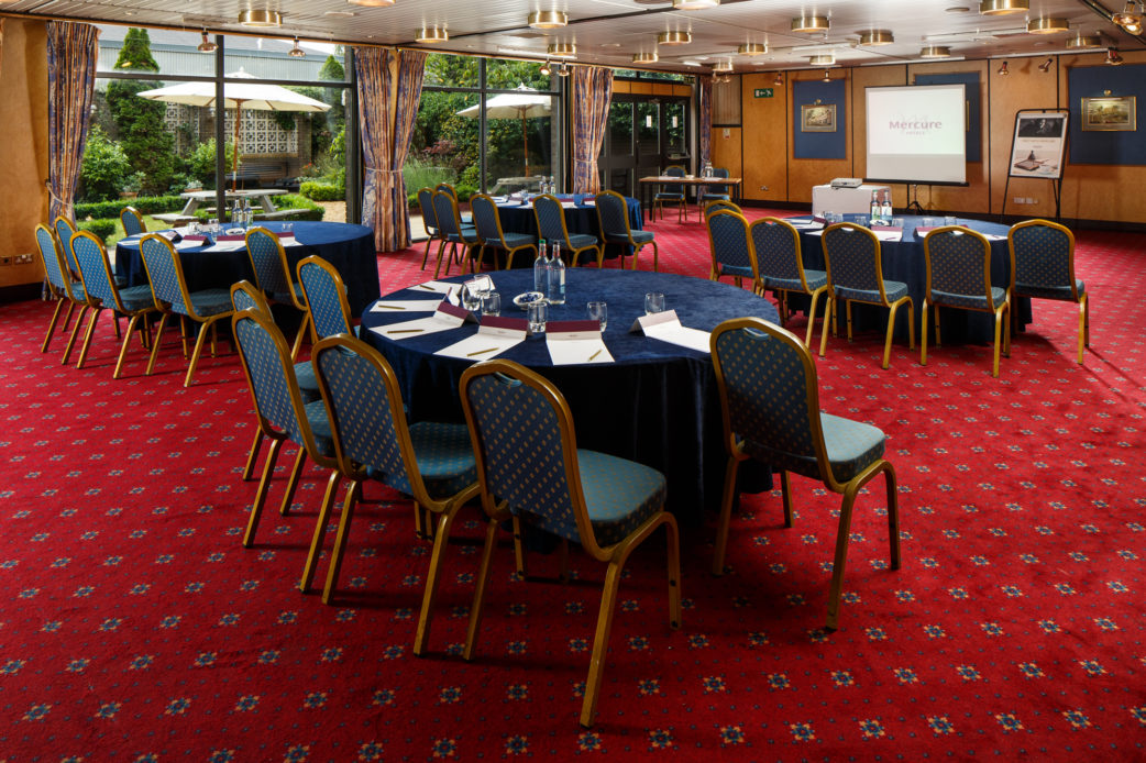 The City Suite at Mercure Norwich Hotel, set up for a meeting, cabaret style tables