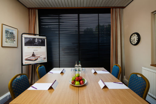 The First Avenue meeting room at Mercure Norwich Hotel, set up for a meeting, bowl of apples on the table