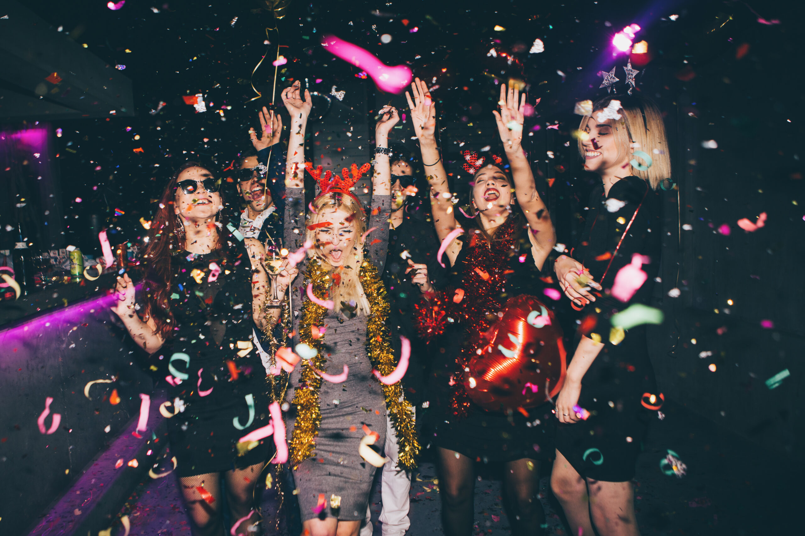 Group,Of,Friends,At,Club,Having,Fun.,New,Year's,Party Funny picture of group celebrating new years eve